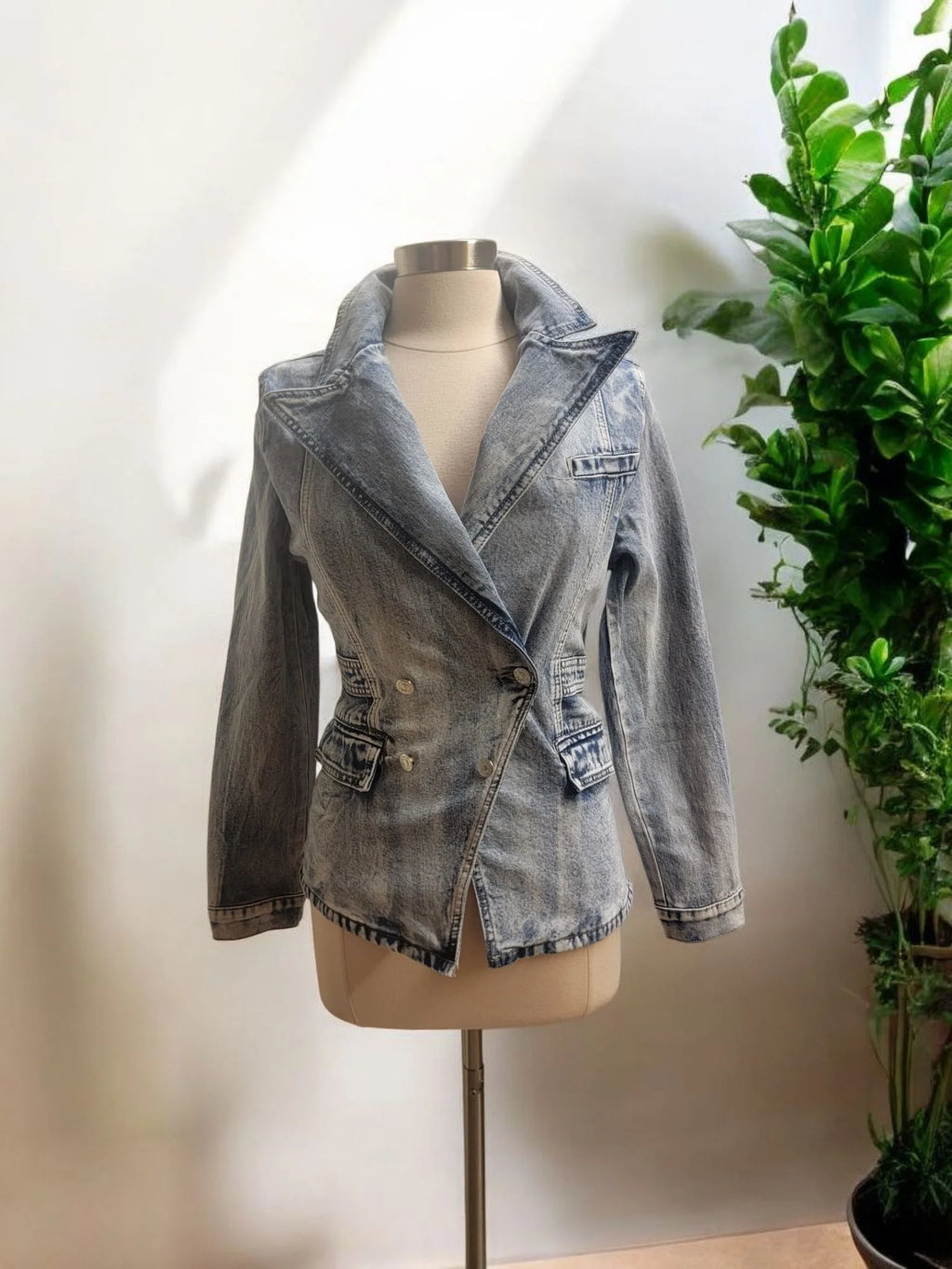 Denim jacket with button closure